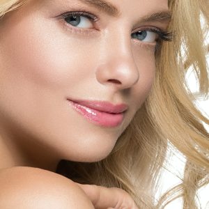 Beautiful blonde with long beautiful eyelashes and blonde hair beautyful healthy skin and pink lips